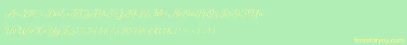 ShellyScript Font – Yellow Fonts on Green Background