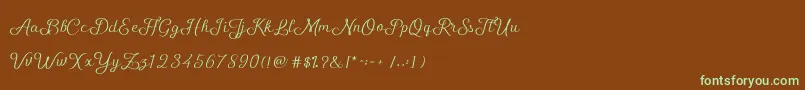 フォントShellyScript – 緑色の文字が茶色の背景にあります。