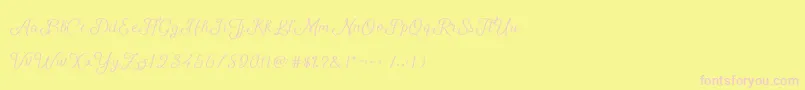 Fonte ShellyScript – fontes rosa em um fundo amarelo