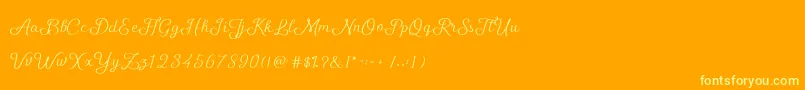 ShellyScript-Schriftart – Gelbe Schriften auf orangefarbenem Hintergrund