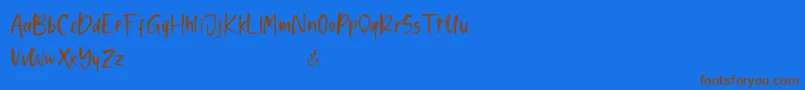 Shelma and Hugie Sans Font – Brown Fonts on Blue Background