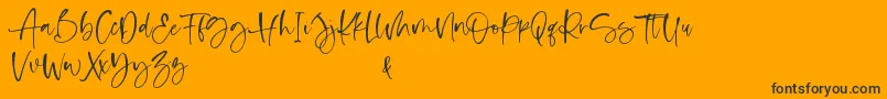 Shelma and Hugie-Schriftart – Schwarze Schriften auf orangefarbenem Hintergrund