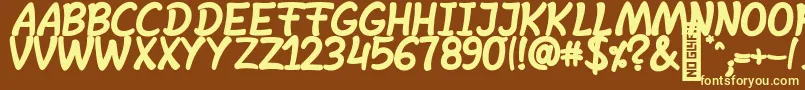 SheltaHand  BoldItalic-fontti – keltaiset fontit ruskealla taustalla