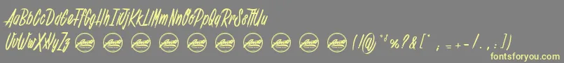 フォントShenanigans basic PersonalUseOnly – 黄色のフォント、灰色の背景