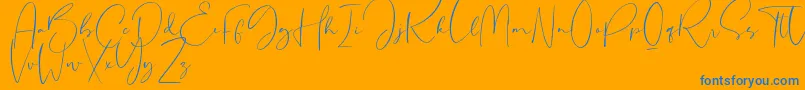 Sheridan-Schriftart – Blaue Schriften auf orangefarbenem Hintergrund