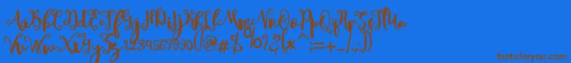 sheyna Font – Brown Fonts on Blue Background