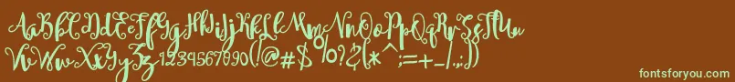 フォントsheyna – 緑色の文字が茶色の背景にあります。