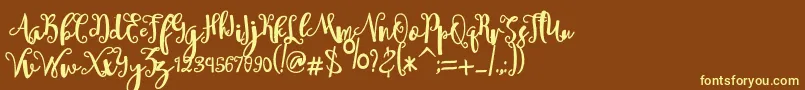 sheyna-Schriftart – Gelbe Schriften auf braunem Hintergrund