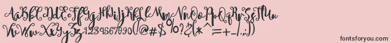 sheyna-Schriftart – Schwarze Schriften auf rosa Hintergrund
