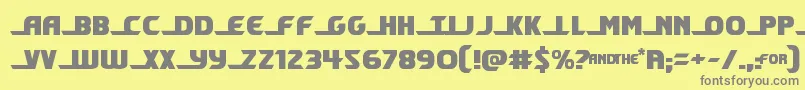 shiningherald-fontti – harmaat kirjasimet keltaisella taustalla