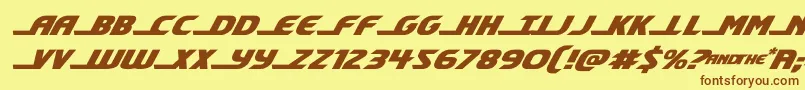 フォントshiningheraldexpandital – 茶色の文字が黄色の背景にあります。