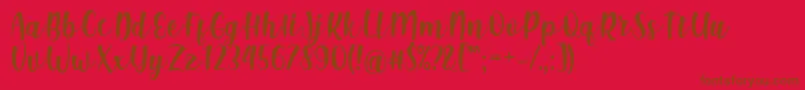 フォントShink Font by Rifki 7NTypes – 赤い背景に茶色の文字