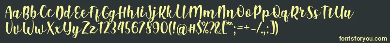 Shink Font by Rifki 7NTypes Font – Yellow Fonts on Black Background