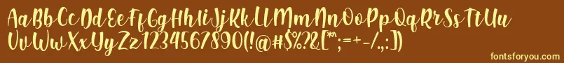 Shink Font by Rifki 7NTypes-fontti – keltaiset fontit ruskealla taustalla