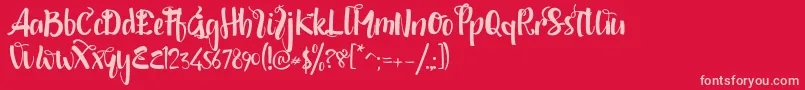 shintya DEMO-fontti – vaaleanpunaiset fontit punaisella taustalla