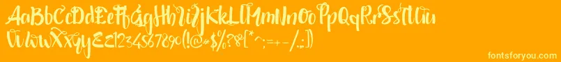 shintya DEMO-fontti – keltaiset fontit oranssilla taustalla