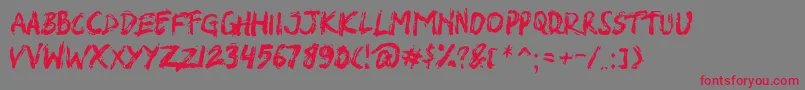 フォントSHIRK – 赤い文字の灰色の背景