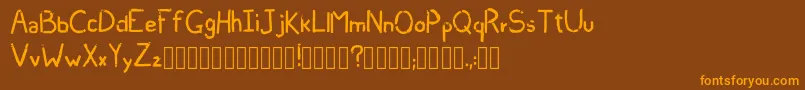 フォントShivers Regular  – オレンジ色の文字が茶色の背景にあります。