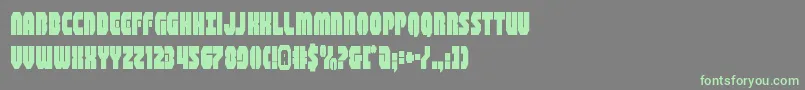 フォントshogunatecond – 灰色の背景に緑のフォント