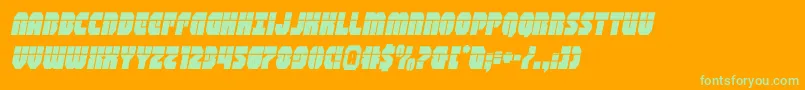 shogunatelaserital-Schriftart – Grüne Schriften auf orangefarbenem Hintergrund