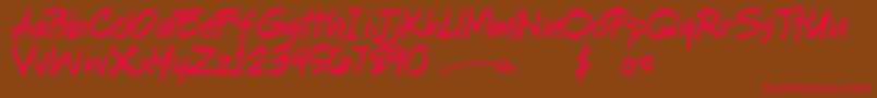 フォントShookenDemo – 赤い文字が茶色の背景にあります。