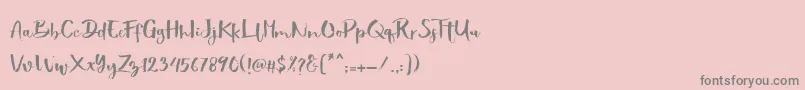 Showety Brush-Schriftart – Graue Schriften auf rosa Hintergrund