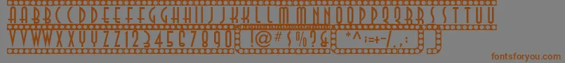 Showtime Font – Brown Fonts on Gray Background