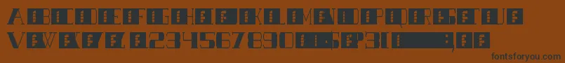 SHOWTUNES-fontti – mustat fontit ruskealla taustalla