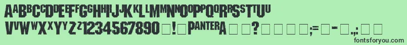 shredded Font – Black Fonts on Green Background