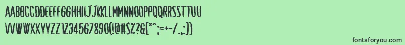 Shut Up and Love Me-Schriftart – Schwarze Schriften auf grünem Hintergrund