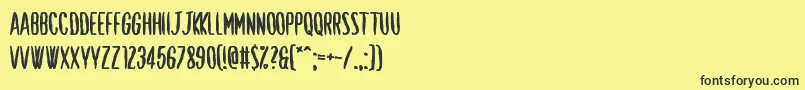 Shut Up and Love Me-fontti – mustat fontit keltaisella taustalla
