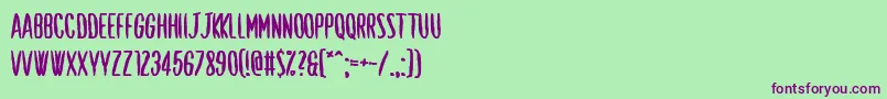 Shut Up and Love Me-Schriftart – Violette Schriften auf grünem Hintergrund