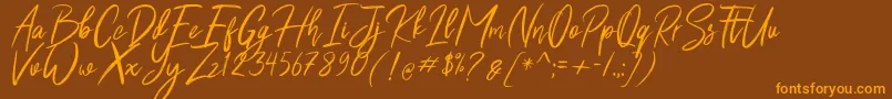 Shutten Reason Free Font – Orange Fonts on Brown Background