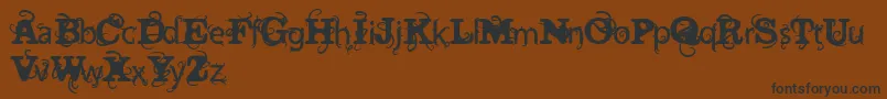 Шрифт VtksWineLabelTwo – чёрные шрифты на коричневом фоне