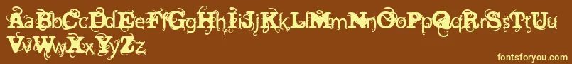 Шрифт VtksWineLabelTwo – жёлтые шрифты на коричневом фоне