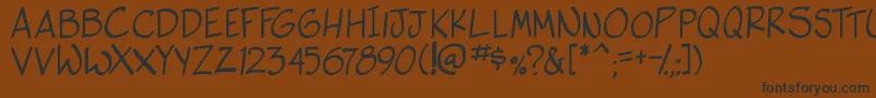 side k Font – Black Fonts on Brown Background
