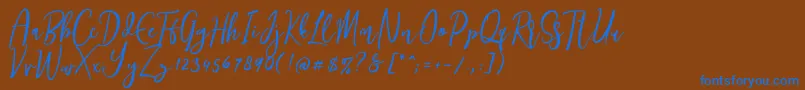 Weitere Informationen zur Siesta-Schriftart Siesta-Schriftart – Blaue Schriften auf braunem Hintergrund