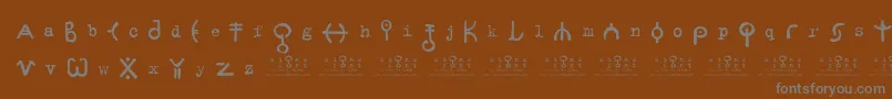 Czcionka signs   zeichen 2 0 – szare czcionki na brązowym tle