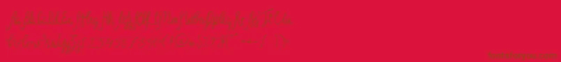 Sild Regular-Schriftart – Braune Schriften auf rotem Hintergrund
