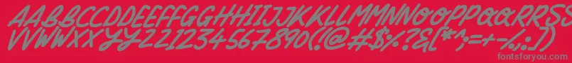 Fonte Silky Smooth Italic – fontes cinzas em um fundo vermelho