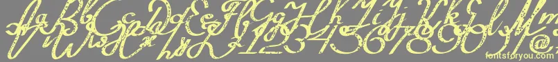 Шрифт Silvestero – жёлтые шрифты на сером фоне
