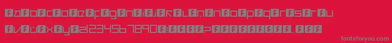 CancranacancarnacaReduxSans-Schriftart – Graue Schriften auf rotem Hintergrund