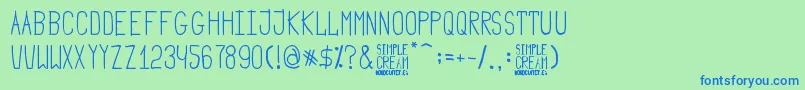 Simple Cream-Schriftart – Blaue Schriften auf grünem Hintergrund