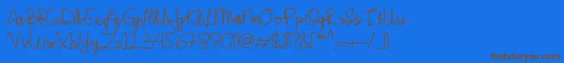 Sinau Font – Brown Fonts on Blue Background