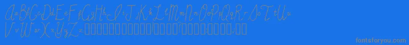 SincerelyYours Regular-Schriftart – Graue Schriften auf blauem Hintergrund