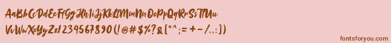 Шрифт Sinestta – коричневые шрифты на розовом фоне