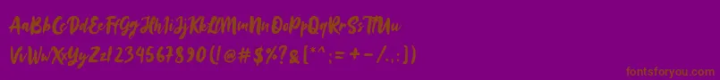 フォントSinestta – 紫色の背景に茶色のフォント