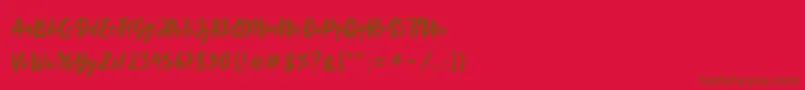Sinestta Font – Brown Fonts on Red Background