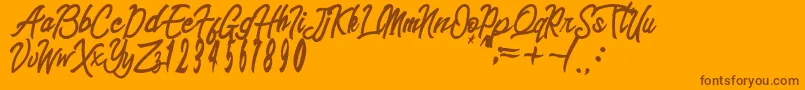 sinetesia-Schriftart – Braune Schriften auf orangefarbenem Hintergrund