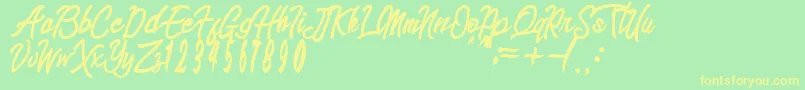 sinetesia Font – Yellow Fonts on Green Background